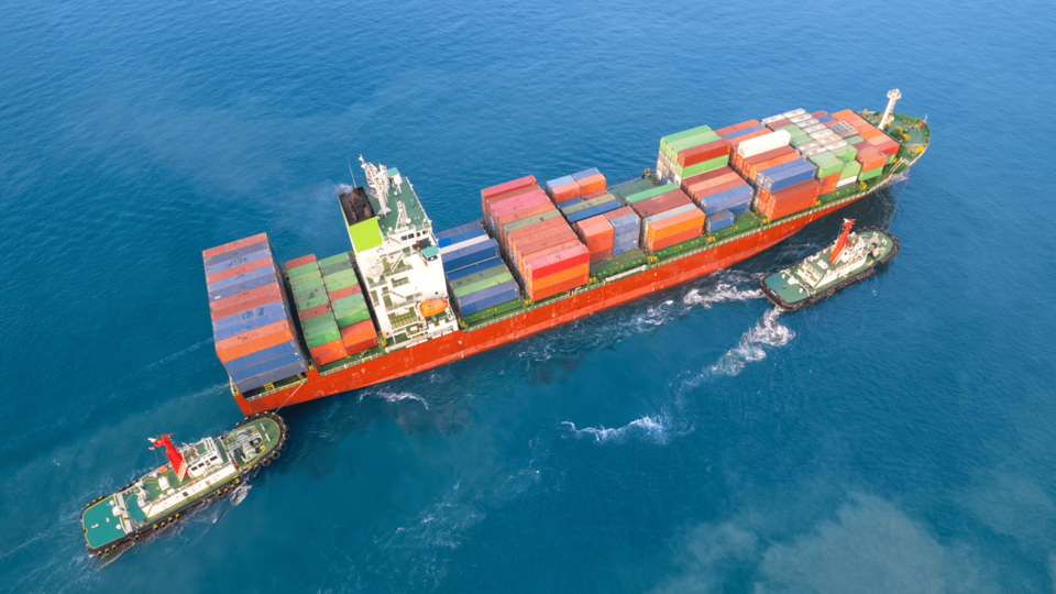 Top view of cargo ship carrying freight containers